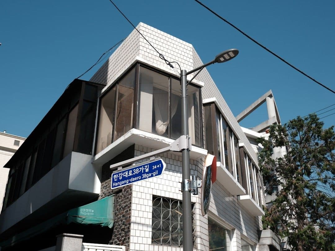 A modern building stands on a street corner.