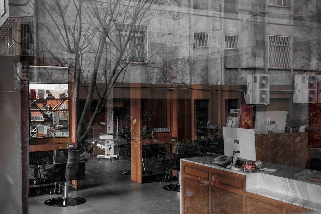 photo of office room with transparent glass wall