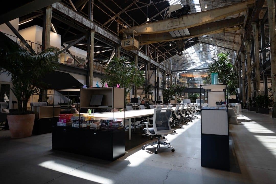 a large open room with a lot of desks and chairs