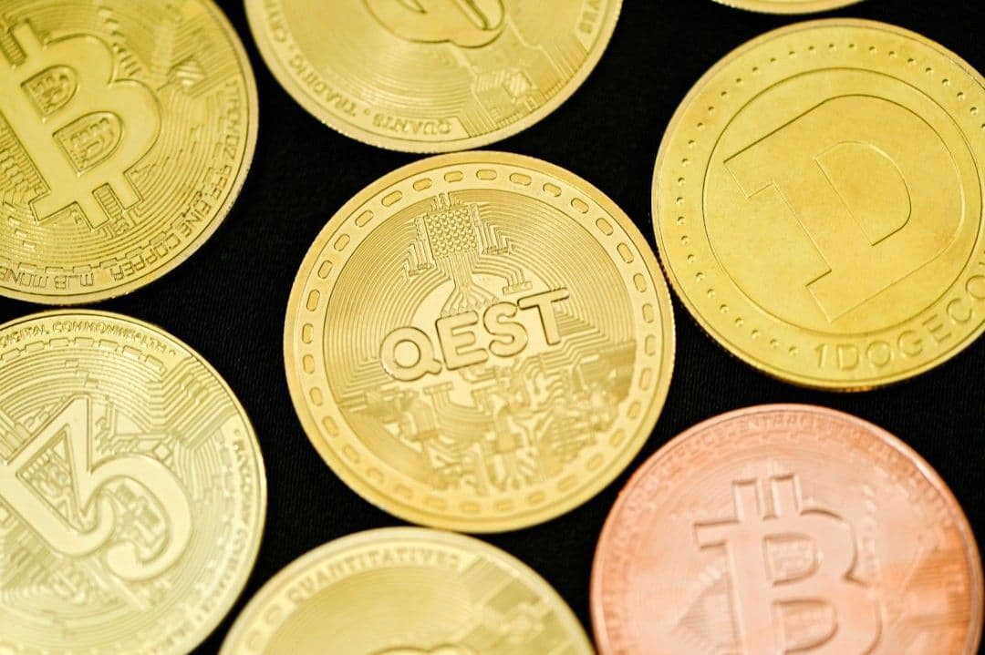 a bunch of bitcoins sitting on top of each other
