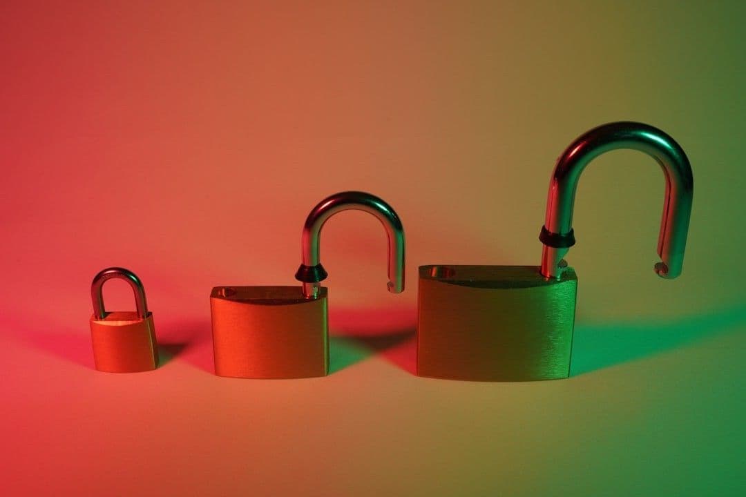 two green and silver padlock