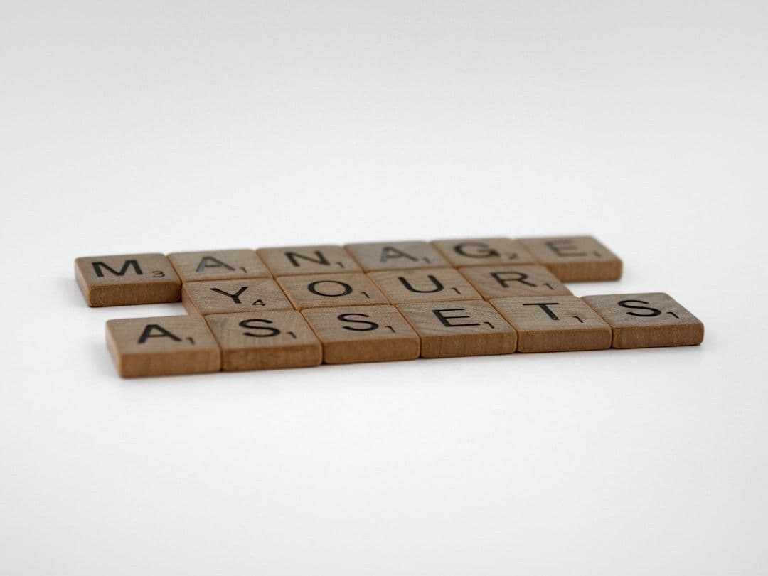 a couple of scrabble tiles sitting on top of each other